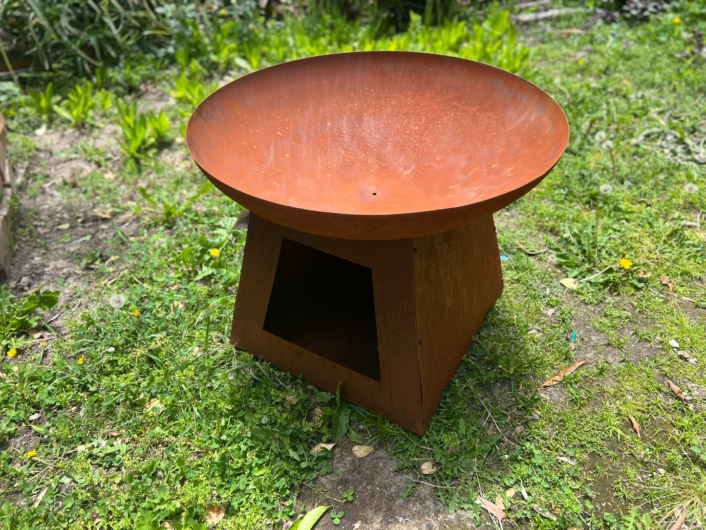 Large 80cm Wok Style Firepit with Tapered Base can store firewood